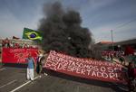 protester. Hjemløse brasilianere demonstrerer mod de mange millioner, der bruges på VM i fodbold, mens social velfærd ikke prioriteres fra magthavernes side. 
