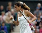 Mestermager.  Amelie Mauresmo vandt selv Wimbledon i 2006, mens hu sidste år var rådgiver for mesteren Marion Bartoli. 