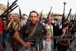 Oprør. Irakiske shiamuslimer har grebet til våben, efter Isis fremrykning. 