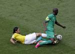 Bror. Det er endnu uvist, om Yaya Toure (i grønt) og storebror Kolo bliver i Brasilien. 