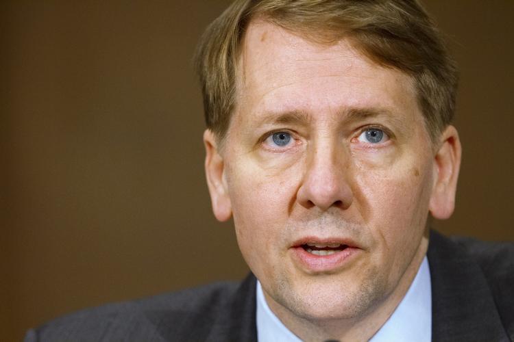 vagthund. Richard Cordray er direktør i Consumer Financial Protection Bureau, som Barack Obama oprettede i 2009 for at holde øje med, at bankerne behandler deres kunder godt. 