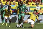 1/8-finale? Elfenbenskysten og Toure (i midten) skal vinde over Grækenland i aften, for at være helt sikre på avancement i Brasilien. 