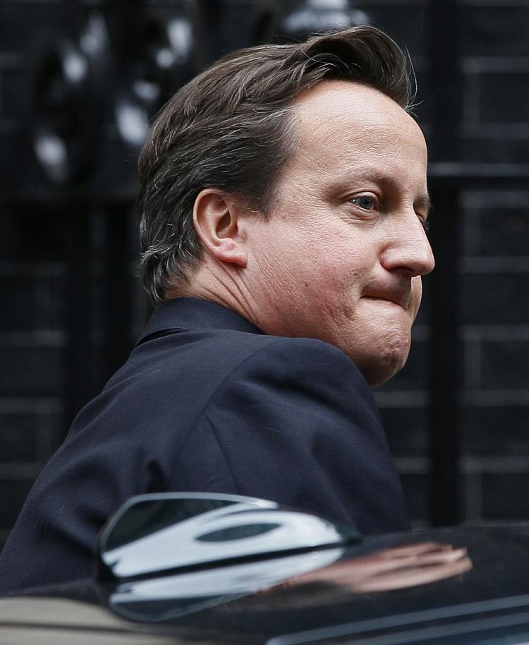 Ansvar. David Cameron er her fotograferet i juli 2011, da skandalen om News of The World brød ud. I dag undskylder han, at han ansatte avisens tidligere chef, Andy Coulson, som spindoktor. 