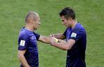 Kaptajner. Robben (tv) og van Persie har scoret hver tre gange ved VM, hvor Holland er mest scorende hold med 10 pletskud. 