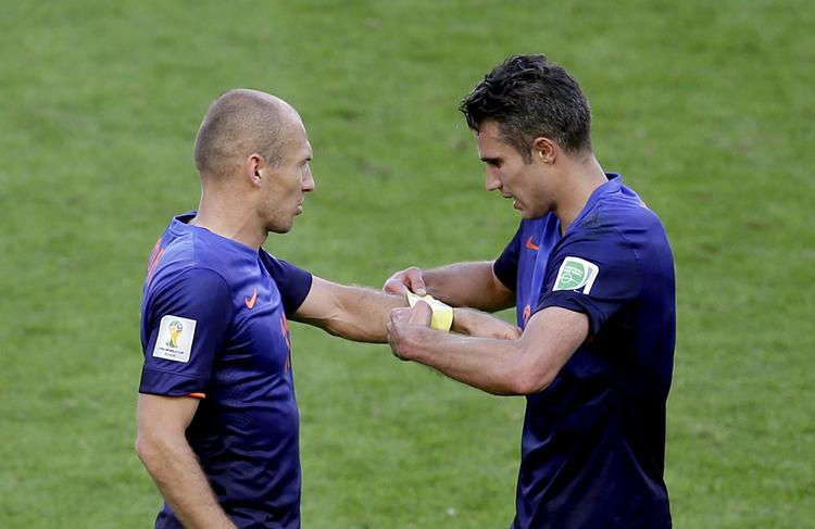 Kaptajner. Robben (tv) og van Persie har scoret hver tre gange ved VM, hvor Holland er mest scorende hold med 10 pletskud. 