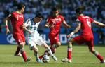 Tæt. Kun en scoring i overtiden forhindrede en iransk sensation mod Argentina og Lionel Messi (i midten) i lørdags. 