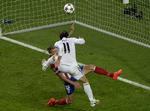 Balance. Gareth Bale viste enormt overblik, da han scorede til 2-1. 