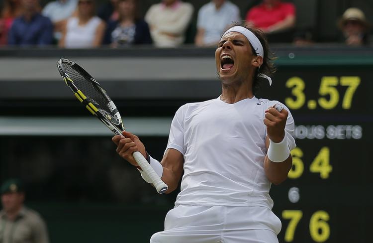 forløsning. Rafael Nadal jubler efter sejren ved Wimbledon over  Lukas Rosol. 