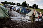MUDDERPØL. Roskilde Festival blev i 2007 forvandlet til et mudderhelvede efter massive mængder regn. Ifølge DMI's prognoser åbner festivalen i år til en våd weekend. 