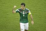 SUCCESRIG. Rafael Marquez fejrer etmål i en af Mexicos gruppekampe. Menlængere end ottendedelsfinalen er hanaldrig nået trods tre VM-deltagelser. 