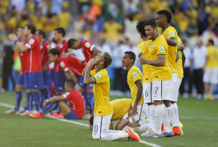 Forløsning. Neymar holdt hovedet koldt, snød målmanden, scorede på straffe mod Chile og bragte Brasilien videre til VM-kvartfinalen. Ikke alle er lige så gode til at håndtere presset. 