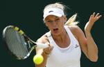 ude. Caroline Wozniacki fik altid vundet initiativet i opgøret mod den stærke tjekke Barbora Zahlavova Strycova. 
