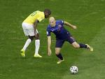 Udspillet. Hollandske Arjen Robben dribler forbi Brasiliens Ramires i bronzekampen ved VM 2014. 