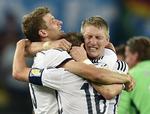 Treenigheden.  Müller (tv), Lahm og Schweinsteiger er naturligvis blandt de 11 i startopstillingen på VM-holdet. 