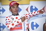 klatrer. Joaquim Rodriguez jagter point i bjergene, og kunne i går tage den prikkede trøje på endnu en dag. Foto: David Stockman/AP 