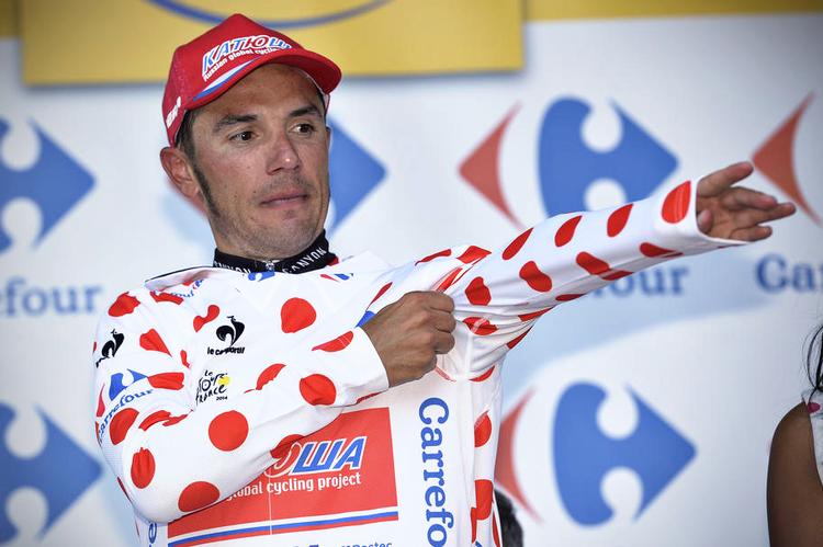 klatrer. Joaquim Rodriguez jagter point i bjergene, og kunne i går tage den prikkede trøje på endnu en dag. Foto: David Stockman/AP 