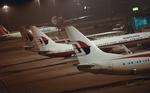Venteposition. Fly fra Malaysia Airlines parkeret i den internationale lufthavn i Kuala Lumpur. Det styrtede fly MH17 fløj over lukket luftrum, da det formentligt blev skudt ned. 