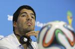 bider. Luis Suarez blev overtaget af FC Barcelona oven på det uværdige bid i kampen mod Italien. 