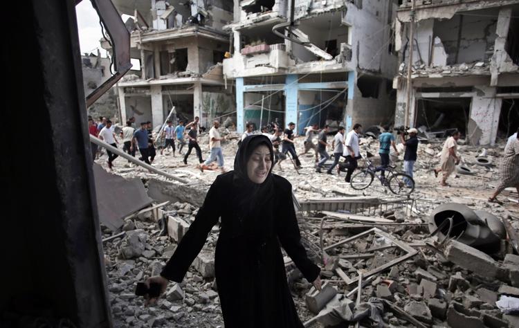 ødelagt. Under den humanitære våbenhvile, der, hvis det står til Israel, forlænges med fire timer, er civile palæstinensere vendt tilbage til deres huse, der for manges vedkommende nu mere har karakter af ruiner. 