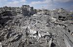 Ruiner. Et oversigtsbillede over Shijaiyah-kvarteret i Gaza, hvor beboere i løbet af lørdagens våbenhvile forsøgte at rydde op. 