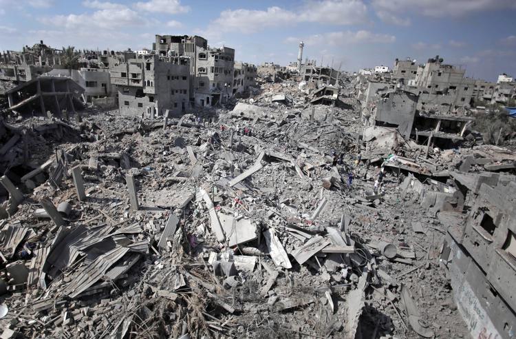 Ruiner. Et oversigtsbillede over Shijaiyah-kvarteret i Gaza, hvor beboere i løbet af lørdagens våbenhvile forsøgte at rydde op. 