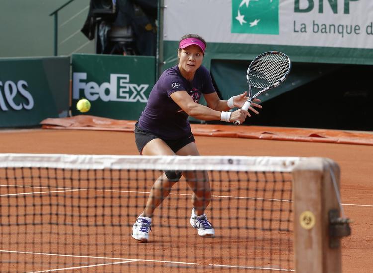 Tennis. Li Na melder afbud til US Open med en knæskade. Her er hun under French Open 