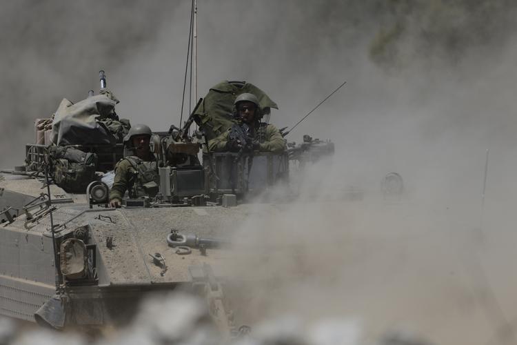TILBAGETRÆKNING. Israels soldater i Gaza bliver omgrupperet til positioner uden for det palæstinesisk styrede område. 