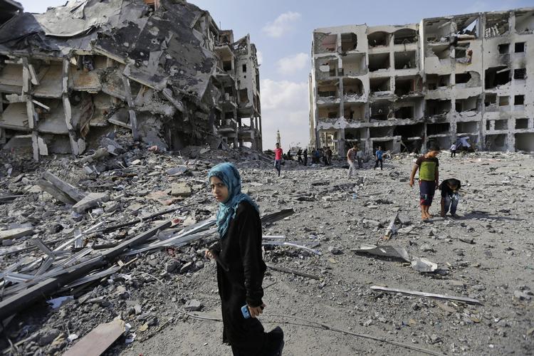 KRATER. Boligblokke står hullede og afbrækkede tilbage efter 29 dages krig mellem Israel og Palæstina. 