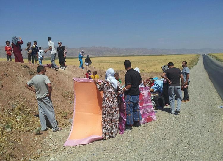 FLYGTNINGE. Kurdere, der tilhører den religiøse minoritet yazidierne, er i nordlige Irak blevet tvunget til at flygte over hals og hoved af jihadisterne fra Islamisk Stat. 