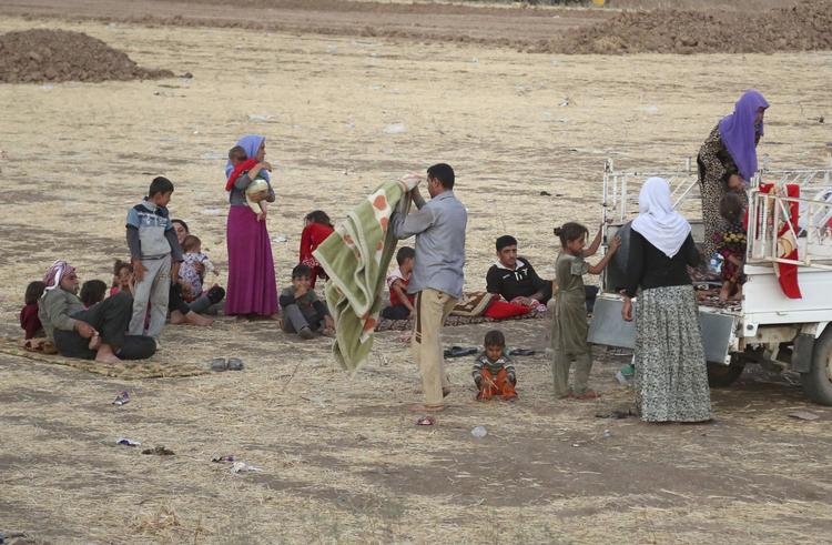 NØDHJÆLP. De mange flygtninge fra det religiøse mindretal yazidierne har forladt hus og hjem uden mad og drikke. De har derfor kraftigt brug for nødhjælp. 
