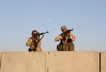 Krig. Kurdiske peshmerga-tropper kæmper mod krigere fra Islamisk Stat i det nordlige Irak. 