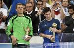 Guld-taber. Argentinas Lionel Messi virkede skuffet, da han efter VM-finalen fik prisen som slutrundens bedste spiller, mens den tyske målvogter fik Manuel Neuer fik Den Gyldne Handske som bedste målmand og så naturligvis VM-guldet. 