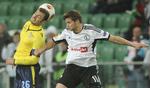 fejlregistreret. Bartosz Bereszynski (th) var med i tre minutter i Legia Warszawas 2-0-sejr over Celtic. Og så blev polakkerne taberdømt. 