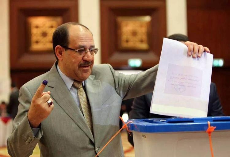 Farvel. Her afgiver Nuri al-Maliki sin stemme ved parlamentsvalget i april. 