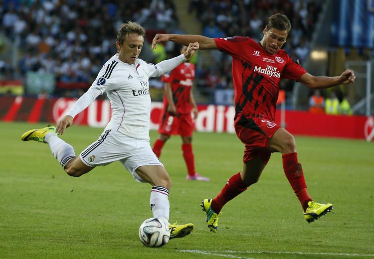 nyklippet. Luka Modric (tv) havde problemer med at falde til i Real Madrid, men nu er kroaten godt tilfreds med livet i Madrid. 