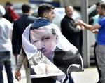 Fan. En tilhænger af Tyrkiets kommende præsident, nuværende ministerpræsident,  Recep Tayyip Erdogan. 