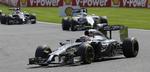 sekser. Kevin Magnussen styrer sin McLaren-racer gennem et sving på Spa-banen i Belgien. 