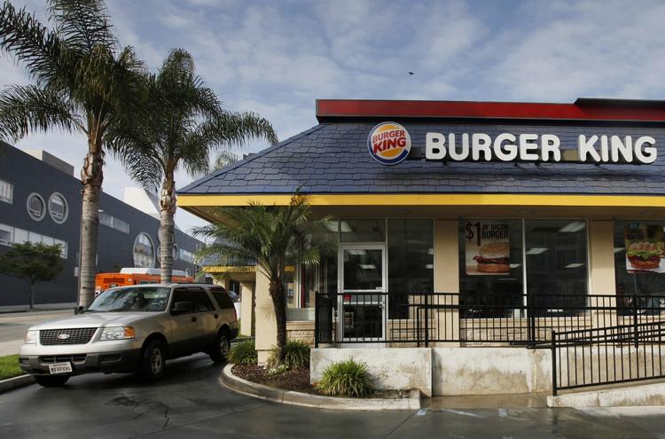 FUSION. Tim Hortons og Burger King kan skabe et fælles selskab med en værdi på cirka 18 milliarder dollars. 