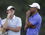 trænerskifte. Tiger Woods (th) med den nye verdensetter, Rory McIlroy. 