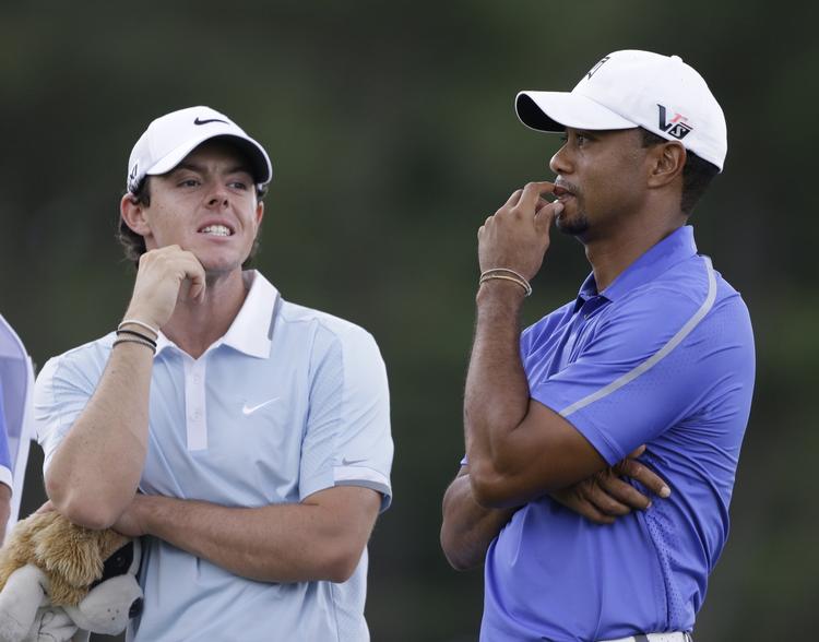 trænerskifte. Tiger Woods (th) med den nye verdensetter, Rory McIlroy. 