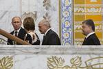 Diplomati. Fra venstre: Den russiske præsident Vladimir Putin, EU's udenrigspolitiske chef, Catherine Ashton, Hvideruslands præsident  Alexander Lukasjenko og til sidst Petro Porosjenko, der nu vil gå i gang med at lave en plan for fred i det østlige Ukraine. 