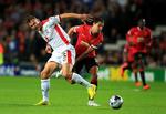 fejlindkøb. Nederlaget mod Milton Keynes Dons er det foreløbige lavpunkt i Manchester Uniteds nedtur siden mesterskabet 2013. Angriber Javier Hernandez (th) har været med under nedturen og rygtes nu til Italien. 