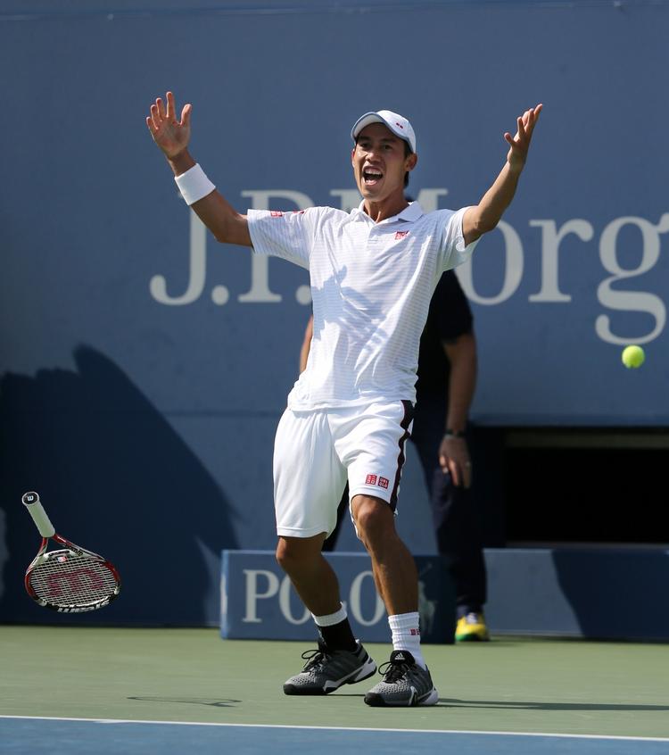 Finaleklar. Kei Nishikori fra Japan jubler efter at han overraskende besjrede Novak Djokovic i semifinalen. 