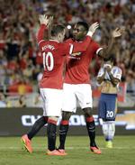 solgt. Danny Welbeck (th) har spillet i Manchester United, siden han var otte år gammel. Flere af klubbens fans er kede af, at klubben har solgt et talent fra eget akademi. 