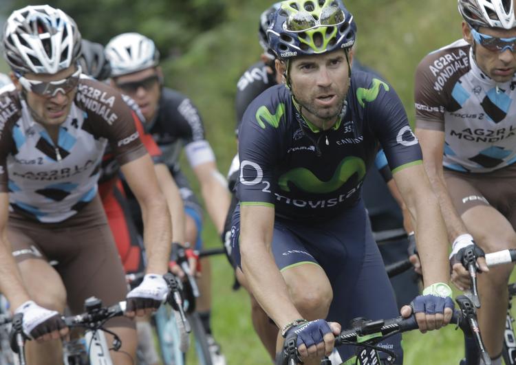 forvandlet.  Alejandro Valverde (th) var søndag udmattet efter strabadserne i Tour de France. Men i dag leverede han et fantastisk løb og erobrede verdenstronen. 