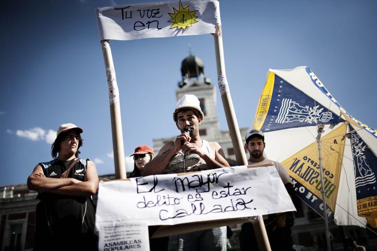 PROTEST. Unge spaniere protesterer i Madrid mod den høje arbejdsløshed for Europas unge. 
