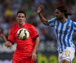 UFARLIG. Selv om der ikke var megen magi i Lionel Messi eller FC Barcelona, endte Malaga med at tage hårdhændet fat i argentineren. 