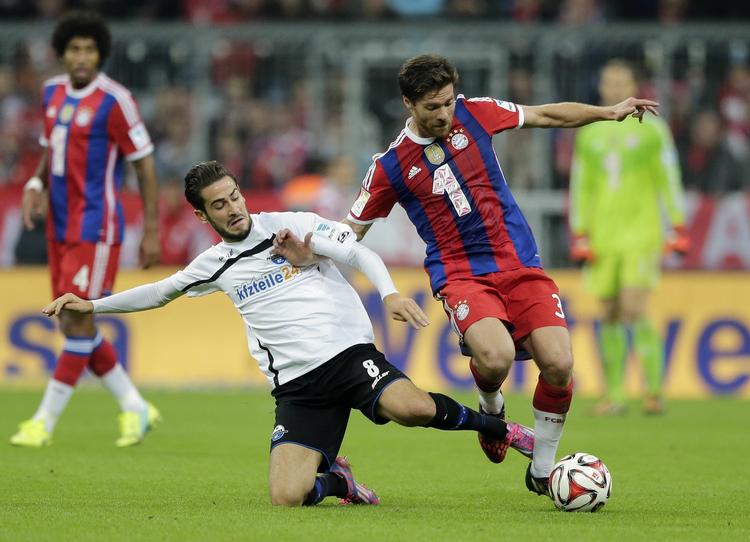 ustoppelig.  Xabi Alonso (th) har vist sig som en særdeles fornuftig investering af Bayern München i sæsonens indledning. 