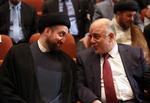 Nyvalgt. Iraks premierminister Haider al-Abadi til højre ses her da regeringen kom på plads i begyndelsen af september. Manden til venstre er Ammar al-Hakim, leder af Islamisk Råd. 