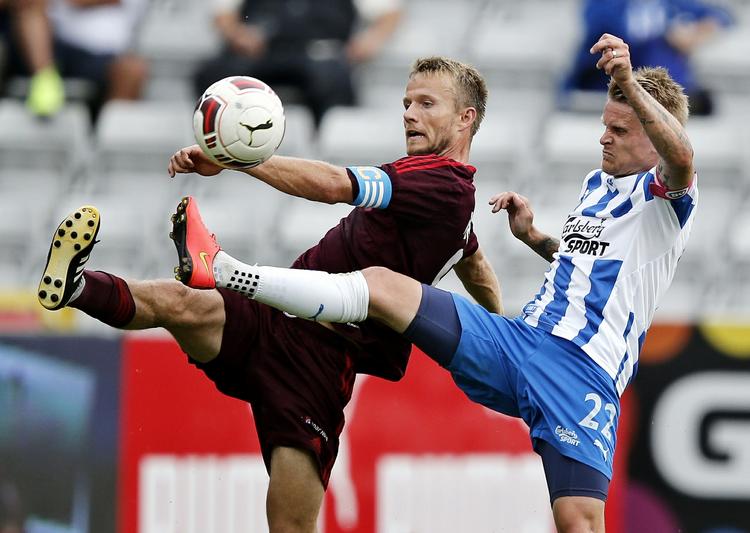 gyser. OB's Ari Skulason (th) er blevet klar til bundkampen mod Silkeborg lørdag, hvor holdet skal starte forfra. 